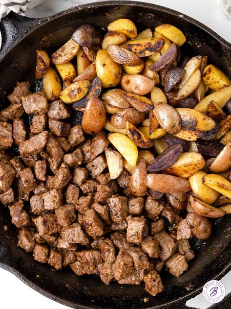 Tender, juicy pieces of sirloin and baby potatoes are tossed with seasoning and coated in an irresistible garlic butter sauce to make these Steak Bites and Potatoes. Ready in under 30 minutes, this easy steak dinner is perfect for any night of the week! Steak Bites And Potatoes, Easy Steak Dinner, Steak And Potatoes, Steak Bites Recipe, Butter Steak, Skillet Potatoes, Easy Steak, Garlic Butter Steak, Steak Butter