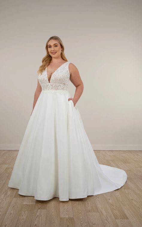 Iconic V-neck satin wedding dress, Style 7895, flaunts a flattering A-line silhouette and graphic lace bodice. Available in plus sizes for timeless romance. Timeless Wedding Dresses Plus Size, V Cut Wedding Dress, Satin V Neck Wedding Dress, Satin Plus Size Wedding Dress, Stella York Style, Satin Ball Gown Wedding Dress, Satin Bridal Gowns, Wedding Gown Inspiration, Plus Size Wedding Dress