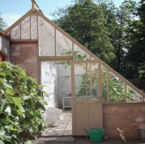 Greenhouse On A Hill, Hillside Greenhouse, Farmhouse Greenhouse, Victorian Tall Wall Greenhouse, Half Brick Wall, Lush Greenhouse, Thermal Mass Greenhouse, Conservatory House, Passive Solar Greenhouse