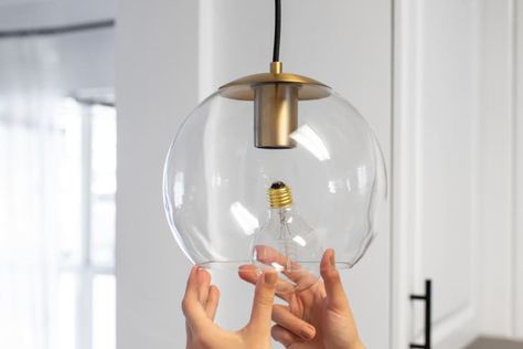 How To Clean Glass Pendant Lights | Kitchn How To Clean Light Fixtures, Cleaning Light Fixtures, Glass Light Globes, Light Globes, Glass Light Fixtures, Glass Pendant Shades, Random Tips, Lights Hanging, Glass Pendant Lights