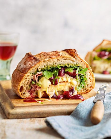 Camembert and roasted grape picnic loaf - delicious. magazine Beach Picnic Recipes, Picnic Loaf, Recipes For Picnics, Recipe Using Sourdough Bread, Burger Lab, Recipes Using Pesto, Rocket Recipes, Camembert Recipes, Lunch Stuff