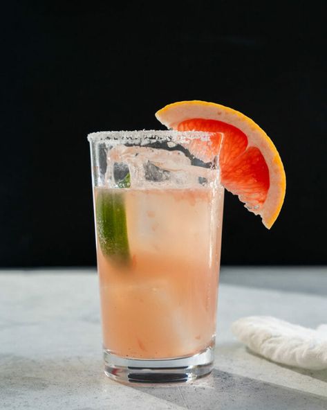 This cocktail’s got a unique name and a beautiful pale pink color! What's salty about it? The salt rim, which accentuates the sweet and sour flavors. It combines grapefruit juice with gin into one tangy and refreshing cocktail! It's perfect as a brunch drink or for happy hour. It’s got a light summery vibe, but it also works in winter when citrus abounds.Variation: Greyhound Cocktail (sans salt rim) Greyhound Cocktail, Citrus Cocktail, Bachelorette Party Drinks, Grapefruit Cocktail, Watermelon Cocktail, Best Summer Cocktails, Citrus Cocktails, Peach Sangria, Cocktails To Try