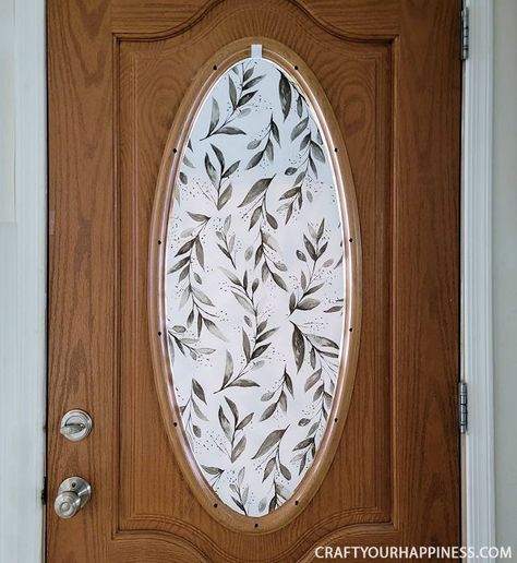 Covering Oval Glass On Front Door, Oval Window Front Door Makeover, Oval Door Window Covering Ideas, Oval Window Covering Ideas, Oval Window Front Door, Front Door Window Covering Ideas, Contact Paper Window, Door Hacks, Diy Wood Door