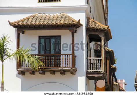 Spanish Balcony Railing, Spanish Balcony Ideas, Colonial Balcony, Spanish Balcony, Roof Balcony, Balcony Roof, Brick Roof, Small Palm Trees, Balcony Bar