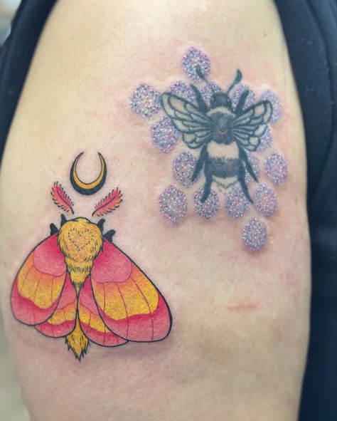 Super pretty moth we did on her arm, and added some glitter details to a bee and honeycomb we had done about two years ago! #moth #mothtattoo #color #colortattoo #tattoos #yellowpinkmoth Fluffy Moth Tattoo, Fuzzy Moth Tattoo, Moth With Eyes Tattoo, Moth With Eyes, Fuzzy Moth, Pink Moth, Eyes Tattoo, Moth Tattoo, Eye Tattoo