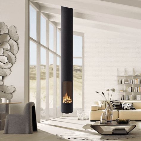 Corner Log Burner, Modern Log Burners, Wall Hanging Fireplace, Focus Fireplaces, Wood Heaters, Modern Wood Burning Stoves, Modern Stoves, Hanging Fireplace, Floating Fireplace