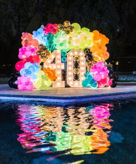 Lights For Birthday Party, Elegant Neon Party, Elegant 80s Party, 90s Theme Balloon Garland, Neon Party Outside, 80s Theme Pool Party, Neon 40th Birthday Party, 80s And 90s Party Ideas, 90's 40th Birthday Party