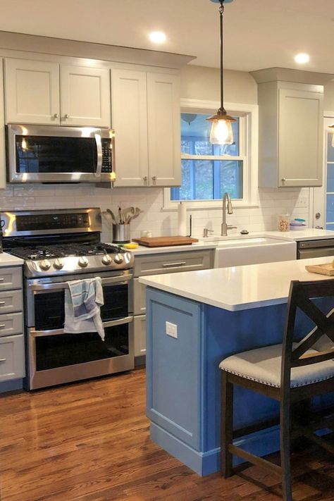 A Smoky Blue island adds a simple but sweet pop of color to this Willow Gray kitchen by Cabinets.com designer Cally. Blue Island Kitchen Grey Cabinets, Kitchens Blue Cabinets, Gray Kitchen Cabinets Blue Island, Gray Cabinets With Blue Island, Gray Cabinets Blue Island, Gray Kitchen Cabinets With Blue Island, Gray Blue Cabinets Kitchen, Blue Grey Cabinets Kitchen, Cool Tone Kitchen