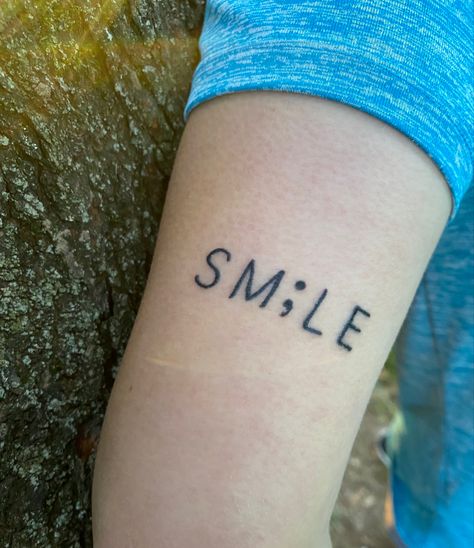 Smile with a semi-colon. Keep pushing through, there is hope. Placement is above my left elbow. Keep Pushing Tattoo Ideas, Keep Pushing Tattoo, Tattoo Above Elbow, Semi Colon Tattoo, Colon Tattoo, Smile Tattoo, Semi Colon, Semicolon Tattoo, Above Elbow