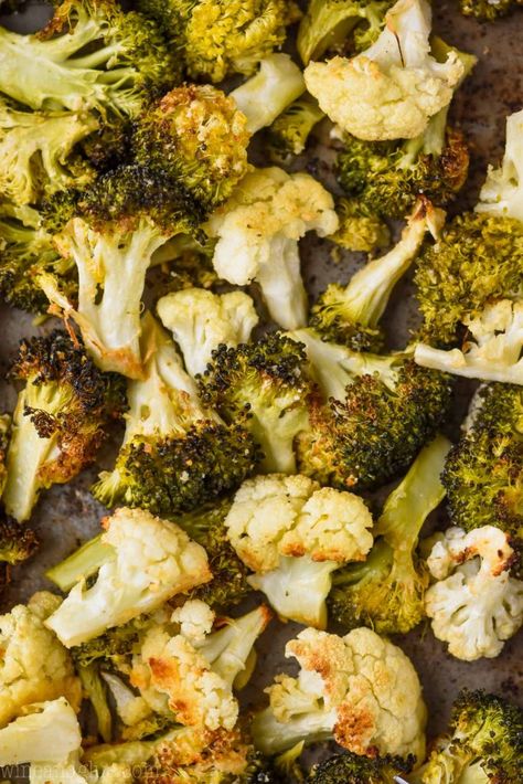 This Roasted Broccoli and Cauliflower is a quick and easy side dish recipe that your whole family will love.  It's easy to customize and change up, making your roasted broccoli and cauliflower with parmesan or even a little lemon.  This is a regular side dish in our house! Cauliflower In Oven, Oven Baked Broccoli, Broccoli Cauliflower Recipes, Roasted Broccoli And Cauliflower, Lemon Broccoli, Seasoned Broccoli, Cauliflower Recipes Healthy, Grilled Broccoli, Grilled Cauliflower