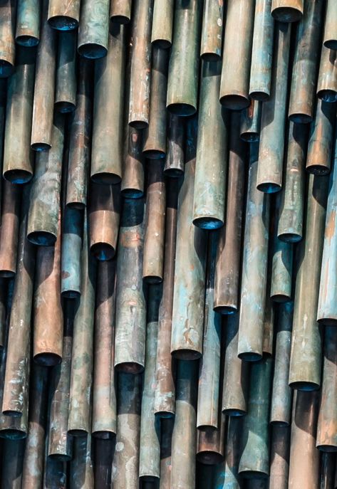 Designer Raphael Navot has used oxidised copper tubes to create a unique and interesting accent wall in a restaurant within a hotel. #AccentWall #Copper #Design Bar Accent Wall, Copper Pipe Art, Unique Accent Wall, Sea Architecture, Parisian Restaurant, Oxidised Copper, Modern Restaurant Design, Copper Pipes, Copper Wall Art