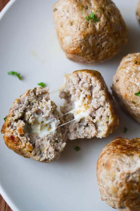 close up shot of a feta-stuffed greek turkey meatball cut in half revealing gooey feta cheese Best Baked Turkey, Herbed Quinoa, Baking With Yogurt, Garlic Yogurt Sauce, Baked Turkey Meatballs, Greek Turkey Meatballs, Turkey Meatballs Recipe, Recipe With Garlic, Garlic Yogurt