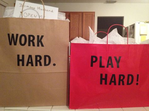 fun gifts for the hard workin husband. I made 1 bag of things to help him "Work Hard" (professional clothes, tie clip etc), and made 1 bag of things to help him "Play Hard" (tickets to Football game, music etc). Bf Gifts, Fun Gifts, Play Hard, Hard Working, Football Game, Work Clothes, Gifts For Husband, Creative Gifts, Hard Work