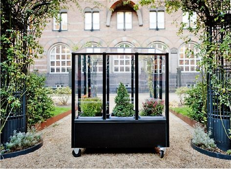 Small Space Gardening: A Tiny Greenhouse on Wheels Greenhouse On Wheels, Urban Greenhouse, Sunset Garden, Plants For Raised Beds, Urban Gardens, Indoor Greenhouse, Greenhouse Interiors, Home Greenhouse, Small Greenhouse