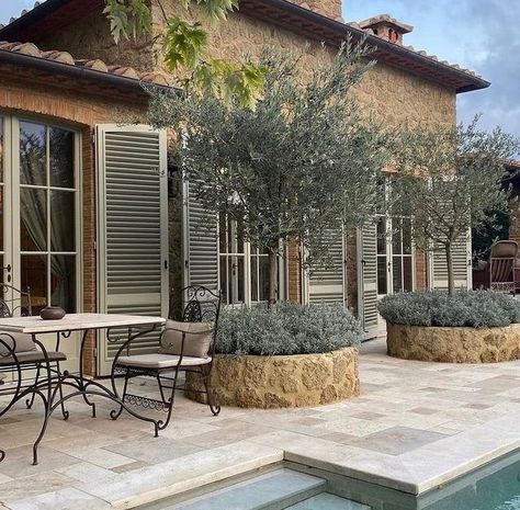 Camilla Falconer on Instagram: "More examples of Mediterranean terraces with beautiful trees softening the stone and incorporating nature …. . . @borgosantopietro @thejaffahotel @casaemiliaostuni . #outdoorliving #mediterranean #naturalstone #trees #pots #terraceinspiration #poolside #mediterraneanstyle #outdoordesign #outdoordecor #nature #slowliving" Mediterranean Terrace, Invisible Hand, White Subway Tiles, Big Windows, City Garden, Gorgeous Gardens, Country Estate, Stone House, Terrace Garden