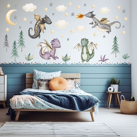 "Such a fun set for your son or daughter's nursery, bedroom or playroom. Four playful dragons in beautiful watercolors, together with trees, clouds, grass and stars. Our fabric decals are amazing. They are applied to the wall very easily - just peel off the backing paper and finger press in place.  Your decals will look like they have been painted on your wall.  Decal sizing information: 1. Dragon #1 - 22\" x 10\" 2. Dragon #2 - 16\" x 13\" 3. Dragon #3 - 15\" x 13\" 4. Dragon #4 - 15\" x 14\" 5 Dnd Baby Nursery, Unique Baby Nursery Ideas, Baby Boy Dragon Nursery, How To Train Your Dragon Nursery, Dragon Nursery Girl, Fun Nursery Themes, Fantasy Nursery Ideas, Baby Dragon Nursery, Dragon Bedroom Ideas