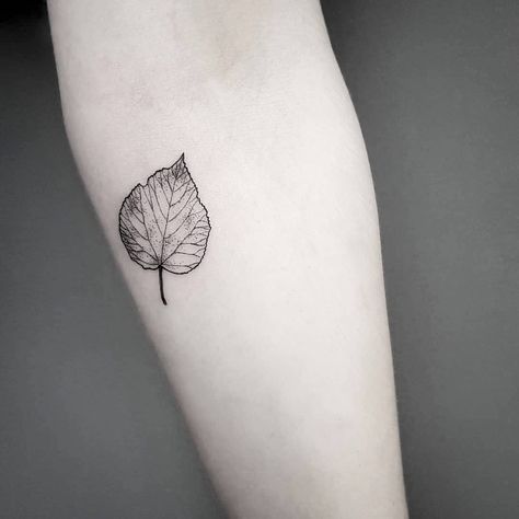 17 Fall-Inspired Tattoos That Show Off the Dreamiest Autumn Leaves Linden Leaf Tattoo, Autumn Leaves Tattoo Black, Elm Leaf Tattoo, Fall Tattoo Ideas Autumn Black And White, Quaking Aspen Tree Tattoo, Birch Leaf Tattoo, Single Leaf Tattoo, Autumnal Tattoo, Linden Tattoo