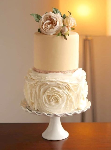 Sophisticated two-tier fondant ivory rosette ruffle wedding cake. Perfect centrepiece for a truly memorable wedding celebration. The rosette detailing, executed with precision and artful design, graces the tiers in a cascading fashion.  The two-tiered structure adds a sense of balance and intimacy to the overall design and the tiers are perfectly stacked.  Cakes can be modified for more height, width and color and more tiers if needed. Coffee Wedding Cake, Shabby Chic Wedding Cake, Wedding Cake Simple Elegant, 2 Tier Wedding Cakes, Elegant Cake Design, Blush Wedding Cakes, Ruffle Wedding Cake, Rose Gold Wedding Cakes, Wedding Centrepieces