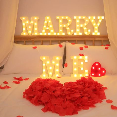 PRICES MAY VARY. MARRY ME Light Sign: Package comes with 7 LED letter lights “M-A-R-R-Y M-E”. The lights are elegant and cozy, the warm white color will create a romantic and comfortable atmosphere, making your wedding proposal amazing. Safe and Portable: The lights are made of environmentally friendly ABS+PP, no wiring, No power outlet needed, each letter requires 2 AA batteries (not included). Easy to use: The lights are portable; you can use them to dress up anywhere you want, Hang on the wal Marry Me Sign, Photo Props Wedding, Letter Lights, Lighted Marquee Letters, Proposal Letter, Engagement Signs, Financial Budget, Romantic Proposal, Light Up Letters