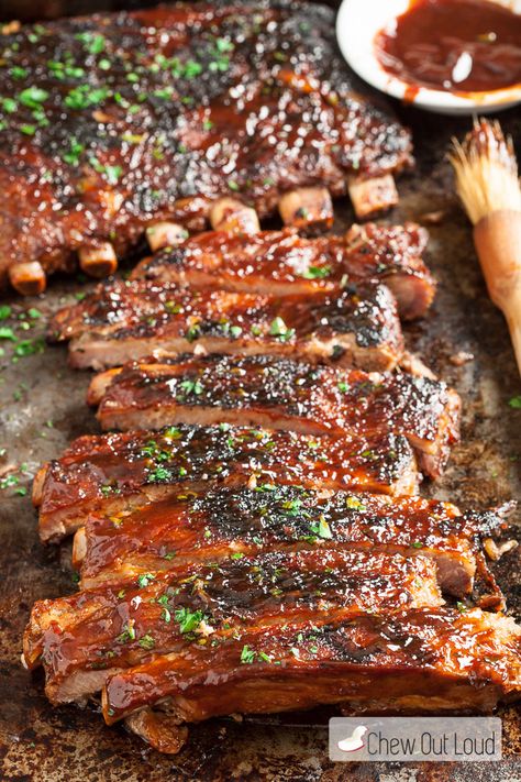 BBQ Sriracha Ribs - Zesty and scrumptious! They are mostly prepared ahead of time, for super tender, fall-off-the-bone ribs. You may never make ribs any other way again. Bbq Ribs In Oven, Baked Bbq Ribs, Baked Beans With Bacon, Ribs In Oven, Jerk Chicken Recipe, Bbq Recipes Ribs, Honey Barbecue, Honey Bbq Sauce, Baked Ribs