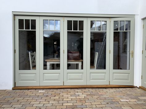 Accoya Bifold doors manufactured by Medina Joinery, painted in Farrow & Ball French Grey French Bifold Doors Patio, Painted Bifold Doors, Bifold Exterior Doors, French Doors Patio Exterior, Bifold French Doors, Wooden Bifold Doors, Wooden Patio Doors, French Doors Bedroom, French Doors Exterior