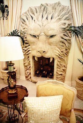 Lion-shaped fireplace, from the home of Kimora Lee Simmons Cave Decorations, Modern Lofts, Cave Bathroom, Tailgate Bench, Cave Room, Automotive Furniture, Fire Places, Automotive Decor, Garage Bar