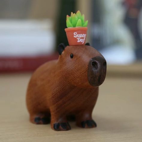 A wooden-carved capybara, its head can hold anything.🤣 #wood #woodcarving #wooddesign #capybara #viral Easter Cake Pops, Gingerbread Man Cookies, Salt Dough, Easter Cakes, Easter Cookies, Whittling, Cold Porcelain, Air Dry Clay, Gingerbread Man