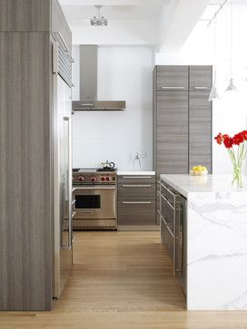 love the gray cabinetry and the island wrapped on three sides / Chelsea Loft modern kitchen Серая Кухня, Contemporary Kitchen Cabinets, Kitchen New York, Kabinet Dapur, Contemporary Doors, Modern Kitchen Cabinet Design, White Oak Floors, Classic Kitchen, Modern Kitchen Cabinets