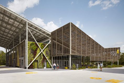 Net-zero flagship McDonald’s at Disney World is a feat of climate-responsive efficiency Net Zero Building, Zero Energy Building, Butterfly Roof, Parking Lot Lighting, Zero Energy, Mexico Design, Mc Donald, Net Zero, Photovoltaic Panels