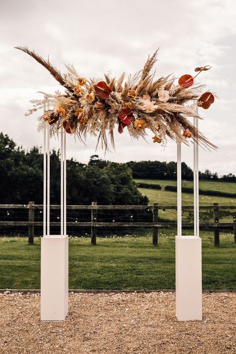 Pampas Grass Arch for Outdoor Wedding Pampas Grass Arch, Pampas Grass Wedding Decor, Grass Wedding Decor, Wedding Breakfast Decor, Boho Summer Wedding, African Inspired Wedding, Grass Centerpiece, Wedding Flower Trends, Pampas Grass Wedding