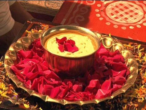 Haldi Ceremony (Preparing the bride and groom with sacred turmeric) Approximate Time: 1 hour, morning Recommended Dress code: Casuals The Haldi ceremony is like an ancient Indian spa ritual. Except… Haldi Rasam, Haldi Ceremony Decorations, शादी की तस्वीरें, Mehendi Decor Ideas, Thali Decoration Ideas, Ramadan Decoration, Desi Wedding Decor, Marriage Decoration, Mehndi Decor