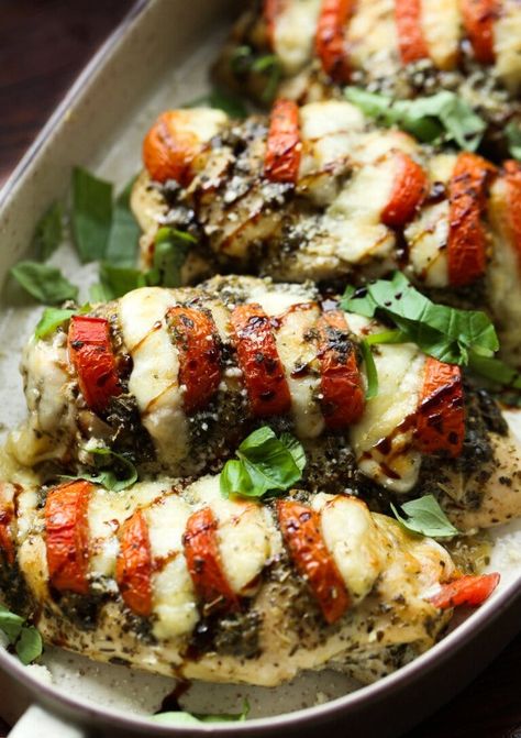 This Caprese Chicken is out of control flavor packed! Stuffed with tomato, mozzarella, and pesto, then topped with fresh basil and Parmesan this EASY chicken recipe will soon be in your weeknight dinner rotation! #cookiesandcups #chickencaprese #chickenrecipe Stuffed Caprese Chicken, Delish Chicken Recipes, Caprese Stuffed Chicken, Italian Caprese Salad, Cookies And Cups, Easy Chicken Recipe, Recipe Cookies, Averie Cooks, Cafe Delites