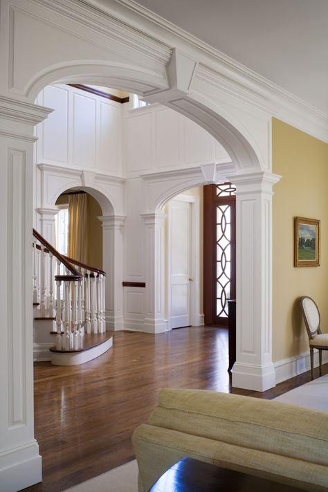 Entry | Mockler Taylor Architects Wainscoting Around Arches, Pillar Moulding Design, Interior Arch Design, Arches In Homes, Arch Wall Design, Entrance Arch Design, Archway Molding, Archway Design, Archways In Homes