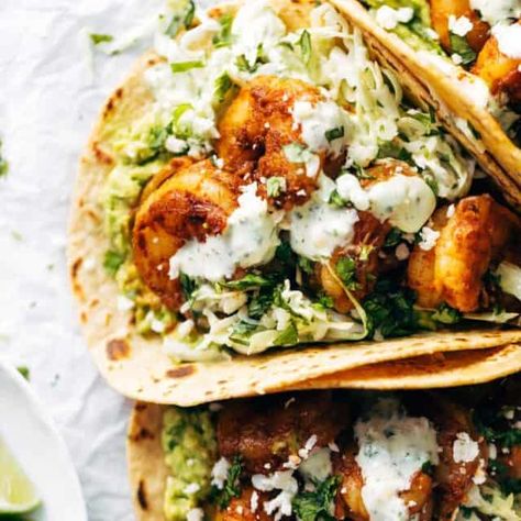 The Best Shrimp Tacos with Garlic Cilantro Lime Slaw - ready in about 30 minutes and loaded with flavor and texture. SO YUM! #tacos #tacotuesday #shrimp | pinchofyum.com Summer Shrimp Tacos, Shrimp Tacos With Cilantro Lime Sauce, Jerk Shrimp Tacos, Coconut Shrimp Tacos, Grilled Shrimp Tacos Recipe, Taco Slaw, Best Shrimp Taco Recipe, Cilantro Lime Shrimp Tacos, Grilled Shrimp Tacos