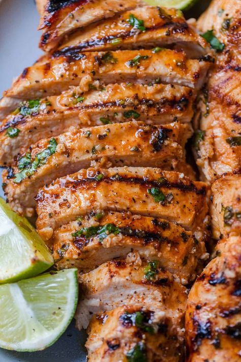 An EASY recipe for grilled Cilantro Lime Chicken, with a 5-minute prep time. The cilantro lime chicken marinade makes juicy, tender chicken. Key Lime Chicken, Grilled Cilantro Lime Chicken, Lime Chicken Marinade, Cilantro Lime Chicken Marinade, Lime Marinade For Chicken, Lime Chicken Recipes, Bbq Chicken Breast, Grilling Menu, Cilantro Lime Chicken