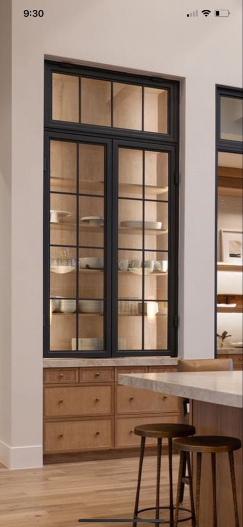 China Cabinets In Kitchen, Modern Built In China Cabinet, Glass Cabinet In Wall, Pantry With China Cabinet, Modern Pantry Double Doors, Built In Dining Room Cabinets Modern, Metal Upper Kitchen Cabinets, Upper Cabinets With Glass Doors, Tall Glass Cabinets Kitchen