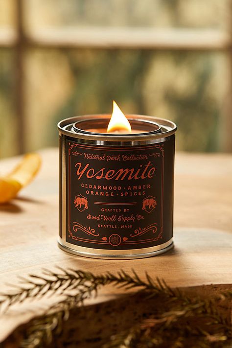 Hand-poured in the USA, this wooden wick candle from Good Well is inspired by the sights, sounds, and scents of national parks. Scent Notes Joshua Tree (red): lavender, cedar, white sage Grand Canyon (tan): huckleberry, bergamot, balsam fir, vanilla Zion (yellow): desert lavender, sage, dried herbs Banff (black): spruce needle, cedar, citrus Redwood (white): oakmoss, citrus, sage, damp earth Yosemite (black): cedarwood, amber, orange, spice | National Park Tin Candle in Black at Terrain Candles In Tin Cans, Anthropologie Candle, Red Lavender, Black Spruce, Wooden Wick Candles, Candles Photography, Tin Candle, Balsam Fir, Lavender Sage