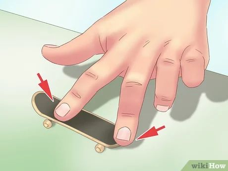 How to Kickflip on a Tech Deck: 12 Steps (with Pictures) - wikiHow How To Do Tech Deck Tricks, Finger Skateboard Tricks, Tech Deck Tricks, Tech Deck Skatepark, Skateboard Tricks, Skatepark Design, Mini Skate, Finger Board, Skateboarding Tricks