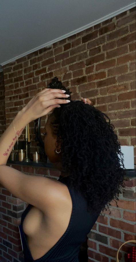 Black girl running her fingers through her locs showing the length of her microlocs after 6 months. Standing in front of aesthetic fireplace. Sister Loc Grid Pattern, Medium Length Micro Locs, Microlocs Aesthetic, 4c Microlocs, Micro Locs Styles, Mirco Locs, Girl Locs, Sisterlocks Styles, Micro Locs