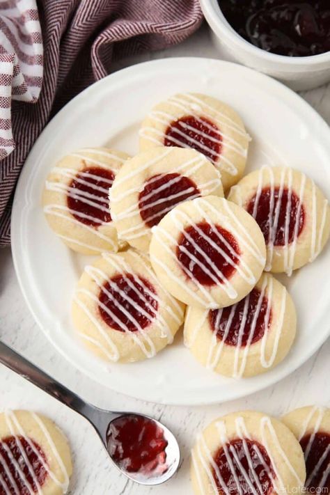 Raspberry Thumbprint, Almond Glaze, Raspberry Thumbprint Cookies, Cookies Aesthetic, New Year's Desserts, Desserts Christmas, Thumbprint Cookies Recipe, Cookies Ideas, Vegan Candies