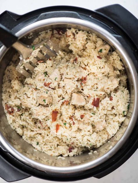 Instant Pot Ranch chicken and rice with crispy bacon is a one-pot dinner. Juicy chicken breast and rice, perfectly seasoned with ranch seasoning. Instant Pot Ranch Chicken And Rice, Pesto Ranch Chicken Instant Pot, Instant Pot Chicken Bacon Ranch, Chicken Flavored Rice In Rice Cooker, Instant Pot Chicken And Rice Dog Food, Spicy Chicken Pasta, Garlic Herb Chicken, Ranch Chicken Recipes, Rice Dinner