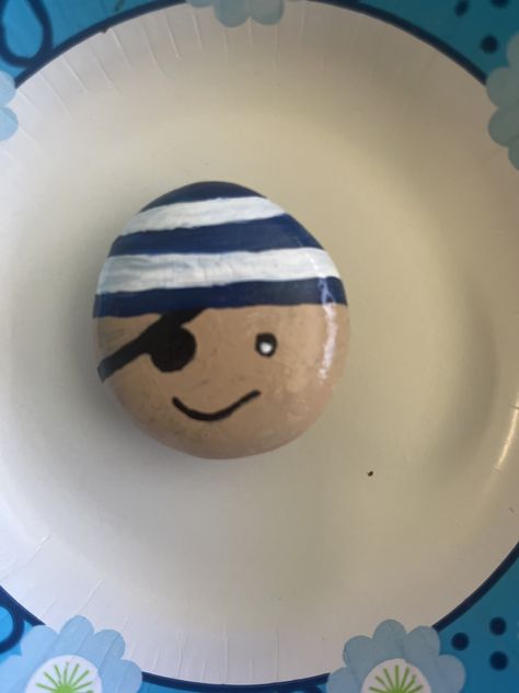 Hand painted pirate rock!! One of a kind. Simple Rock Designs, Beach Rock Art Ideas, Whale Painted Rock, Pirate Rock Painting, Bluey Rock Painting, Rock Painting Ideas Easy Step By Step, Rock Painting Words, Mermaid Painted Rocks, Hand Painted Rocks Ideas