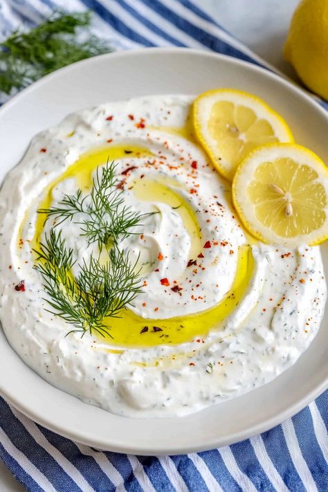 Indulge in the vibrant flavors of Mediterranean cuisine with this delightful Greek yogurt lemon dill sauce recipe. This creamy and zesty sauce is the perfect accompaniment to grilled chicken, roasted vegetables, or as a refreshing dip for pita chips. Made with tangy Greek yogurt, fresh lemon juice, and fragrant dill, this homemade sauce is both versatile and easy to prepare. Flavored Yogurt Recipes, Greek Lemon Sauce, Tilapia Sauce, Dill Sauce Recipe, Yogurt Sauce Recipe, Best Greek Yogurt, Greek Yogurt Sauce, Lemon Dill Sauce, Chicken Roasted