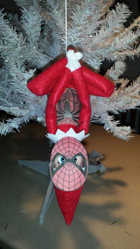 Day 7 Elf on the Shelf 12/4/2014 Spidey hanging from the ceiling fan with dental floss. Elf 2023, Elf Shenanigans, Elf Notes, Elf Ideas Easy, Holiday Marketing, 2023 Ideas, Elf Ideas, Hanging Garland, Holiday Market