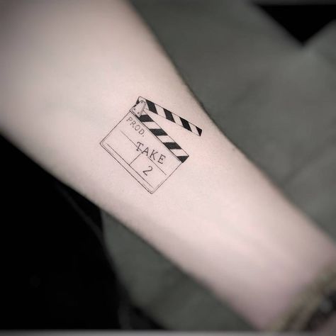 Clapper Board Tattoo, Film Tattoo Ideas Camera, Tattoos For Movie Lovers, Clapperboard Tattoo, Filmmaker Tattoo, Cinema Tattoo Ideas, Film Tattoo Ideas Movies, Cinema Tattoo, Tomorrow Tattoo