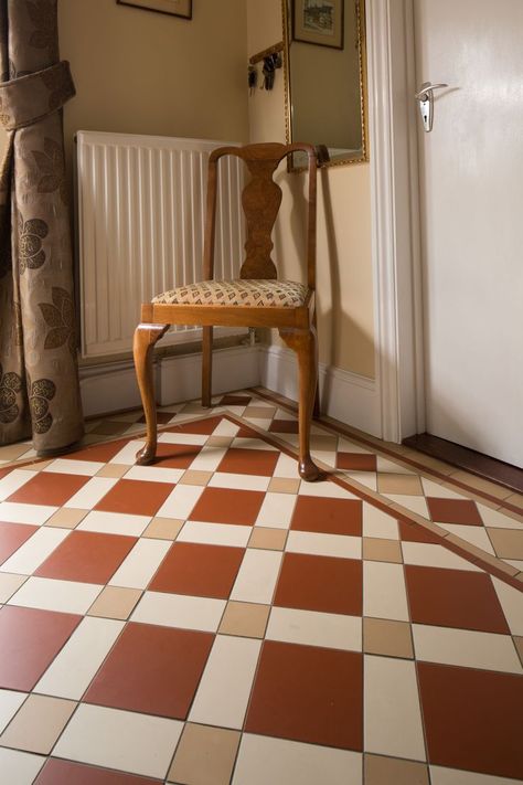 Original Style Victorian Floor Tiles in Falkirk Red, White & London Stone with Melville Border in the hallway of a period property next to a vintage chair Parquet Tiles, London Stone, Hearth Tiles, Tiles Vintage, Victorian Tile, Victorian Floor Tiles, Vintage Tiles, Victorian Floor, Red Floor