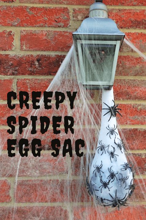 Outside Spider Web Decor, Halloween Spider Nest Diy, Halloween Decorations Spiders Outdoor, Spiders Decorations Halloween, Halloween Spider Egg Sack, Diy Scarecrow Halloween Decorations, Outside Halloween Spider Decorations, Easy Spider Decorations, How To Make Spider Egg Sacks