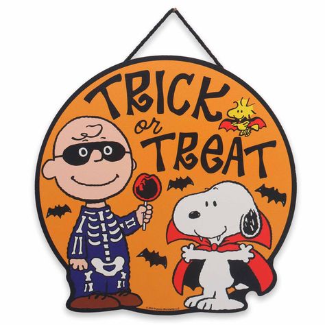 PRICES MAY VARY. Peanuts Official product: Celebrate the joy of Halloween and the magic of childhood with this whimsical wall decor! This captivating piece captures the essence of spooky fun and nostalgia, bringing the beloved characters of Charlie Brown and Snoopy to life in their festive Halloween attire. Fun Vintage Sign: The round orange sign is adorned with a bold black border, emblazoned with the words, "Trick or Treat" in a playful font. Hovering around the sign are whimsical bats, surrou Halloween Typography, Peanuts Party, Peanuts Charlie Brown Snoopy, Halloween Wood Signs, Peanuts Halloween, Peanuts Charlie Brown, Charlie Brown Halloween, Halloween Door Hangers, Snoopy Halloween