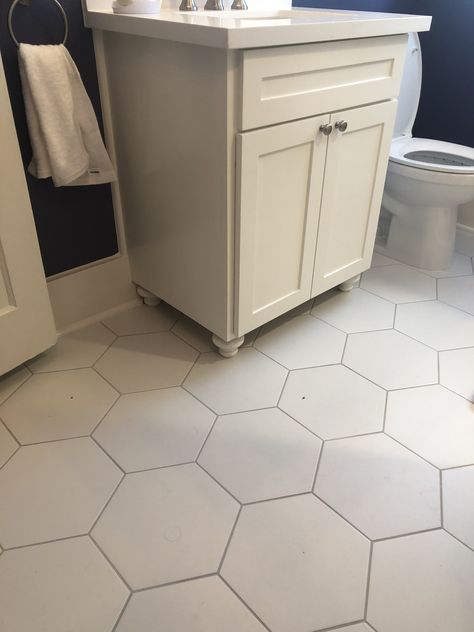 Octagon white tile bath floor with light gray grout to highlight the pattern. Accent with your favorite color. White Hexagon Kitchen Floor, Octagonal Tile Floor, Hexagon Tile With Dark Grout, White Octogon Tiles Bathroom, Small White Hexagon Tile Bathroom, White Octagon Tile Bathroom, Octagon Tile Bathroom Floor, White Hexagon Tile Bathroom Floor, Large Hexagon Tile Bathroom