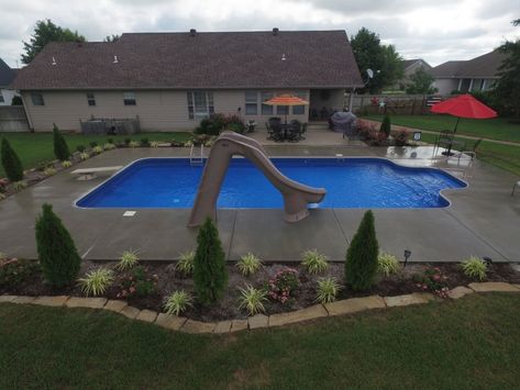 Vinyl Inground Diving Pool with Vinyl End Step, Slide, and Broomswept Patio(1) Inexpensive Pool Ideas Inground, Inground Pool Slides, Dreamy Pools, Pool Layout, Diving Pool, Pool Life, Diving Board, Inground Pool, Backyard Pool Designs